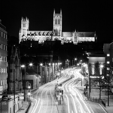 Lincoln Cathedral at night with light trails